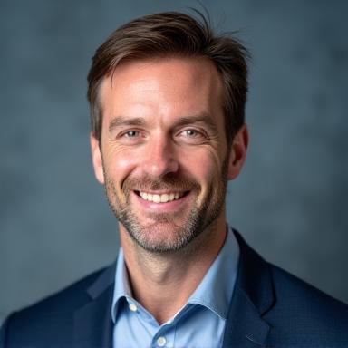 Professional headshot of Richard Sterling, a focused and friendly man.